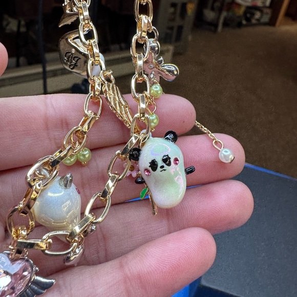 Betsey Johnson Gold Charm Necklace with Cat and Wing Pendants - Picture 5 of 12